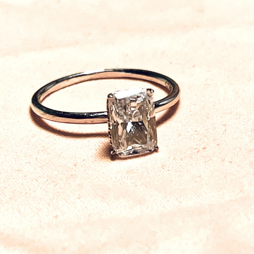 Moissanite and sterling silver engagement ring